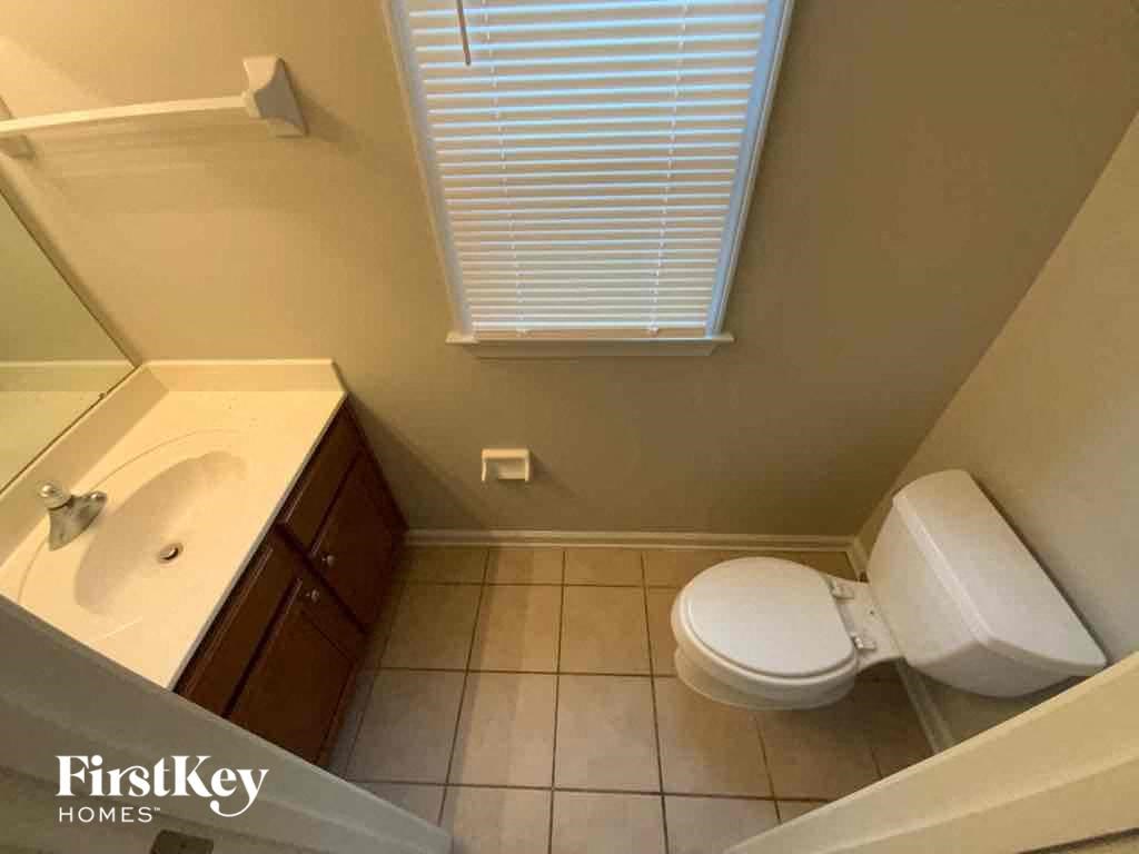 a small bathroom with a toilet and a sink
