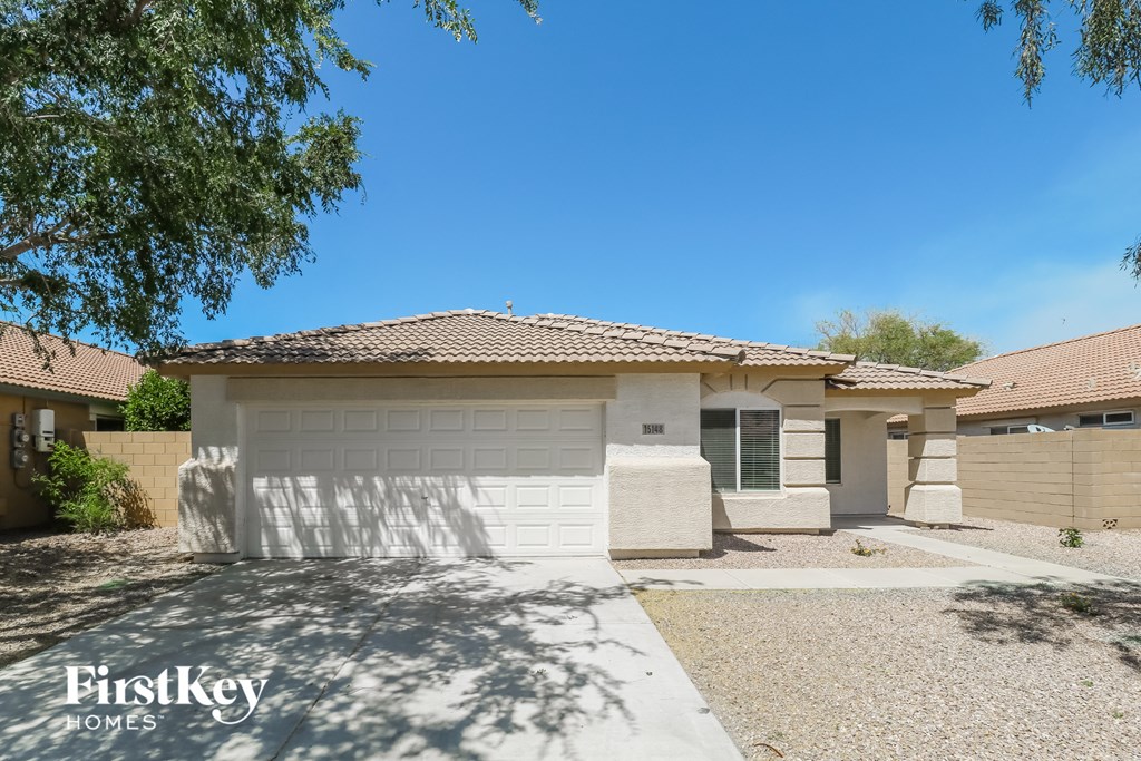 A house with a garage is for sale by FirstKey Homes.
