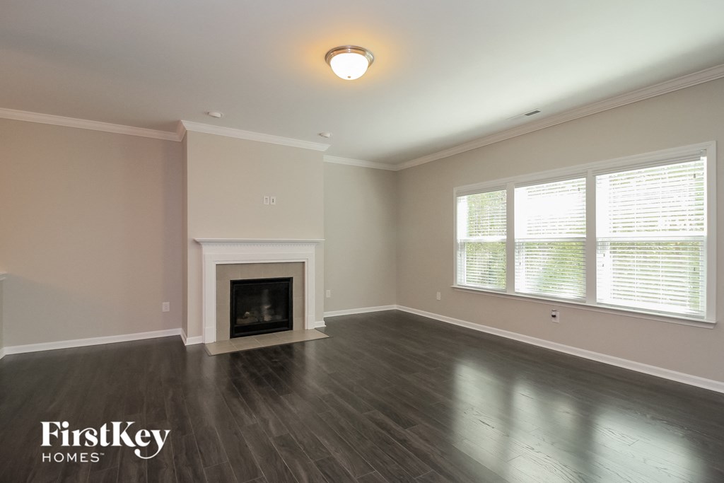 the living room of a house with a fireplace