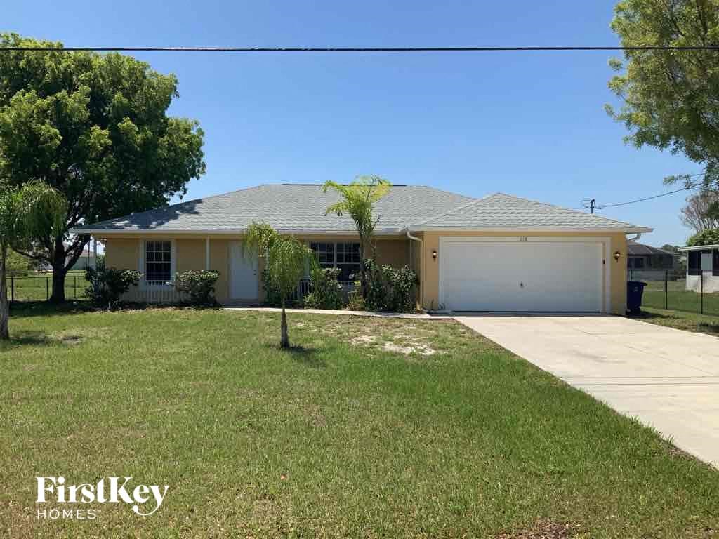 A house with a garage is for sale by Firstkey Homes.
