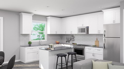a white kitchen with white cabinets and a counter top