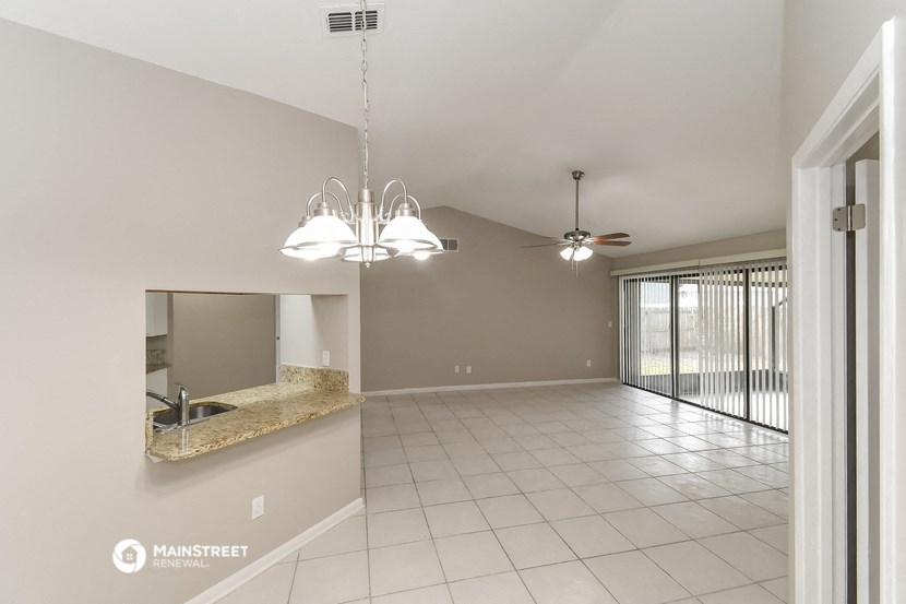 the living room and dining room are spacious and clean