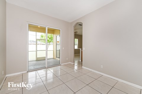 the living room and dining room are spacious and open to the patio