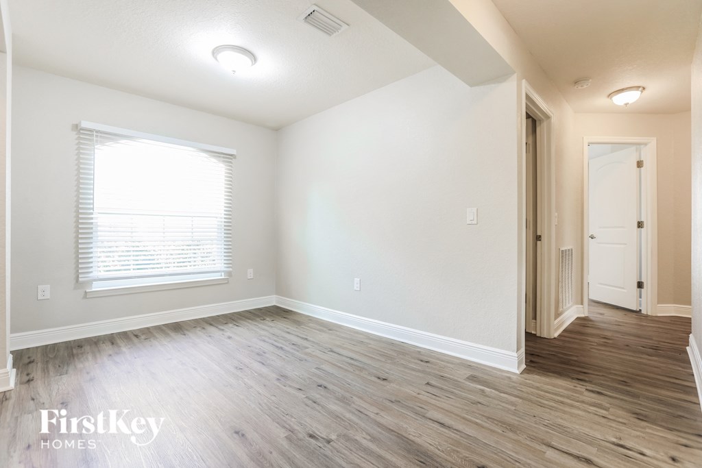 the living room is clean and ready for us to move in