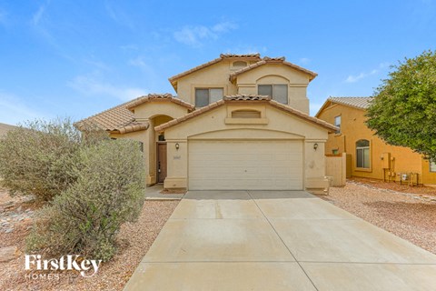 A large house with a garage is for sale.