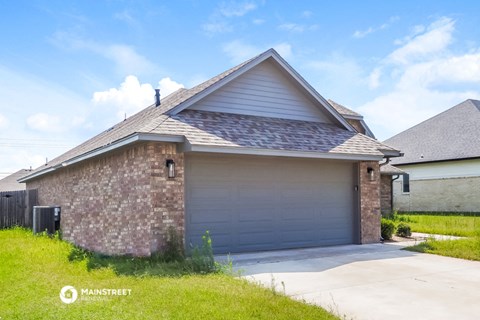 a garage door in front of a house
