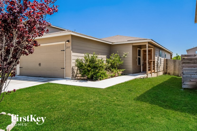 a house with a yard and a lawn