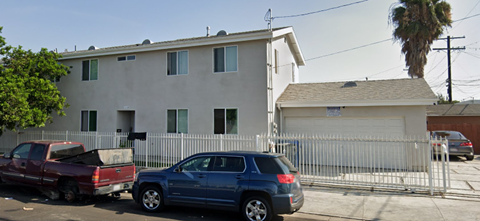 a house with a truck parked in front of it