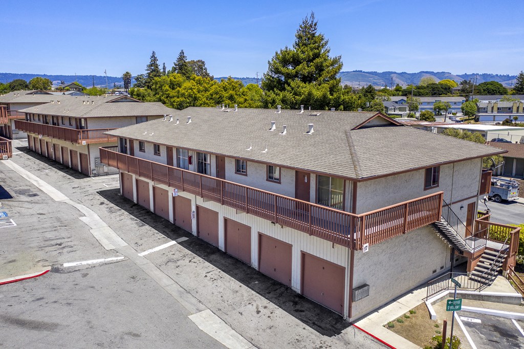 a view of a building from the roof of an apartment building