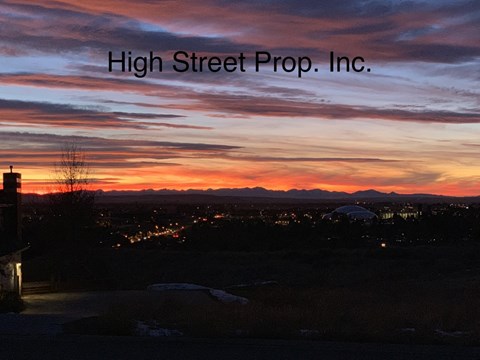 A sunset view with the text "High Street Prop. Inc." overlaid on the image.