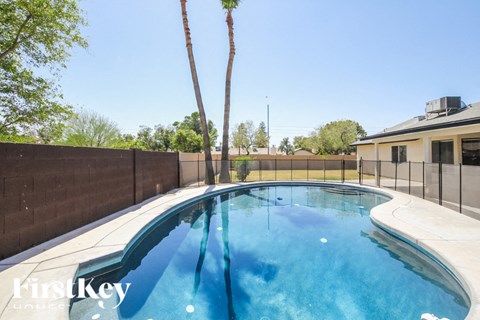 A swimming pool with a FirstKey logo.