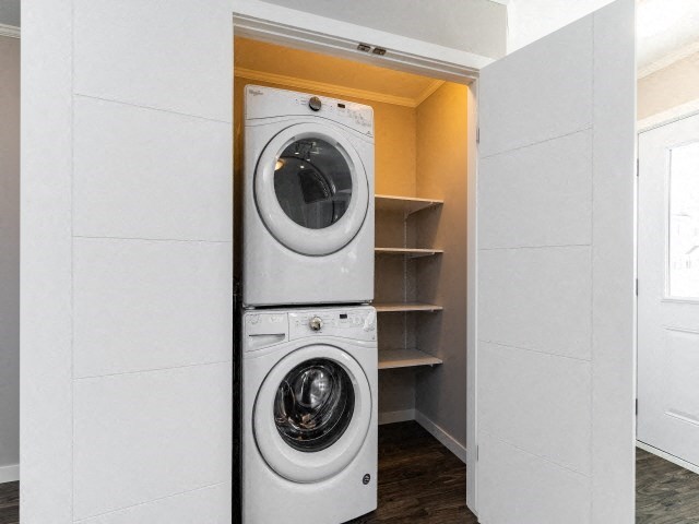 a washing machine and a dryer in a closet