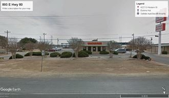 a screenshot of the google street view of a gas station