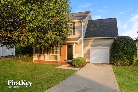 A house with a garage is shown in the image.