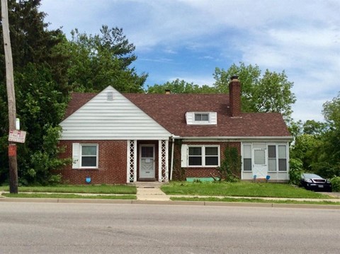 a house on the side of the street