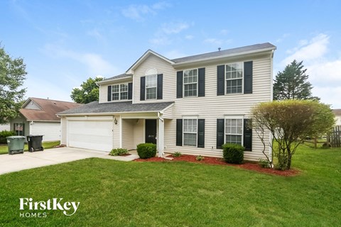 A two-story house with a garage is for sale by FirstKey Homes.