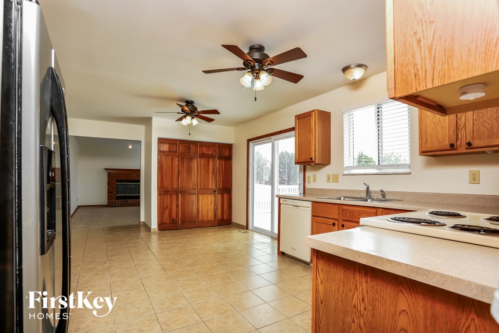 view of the kitchen from the dining area and the living room