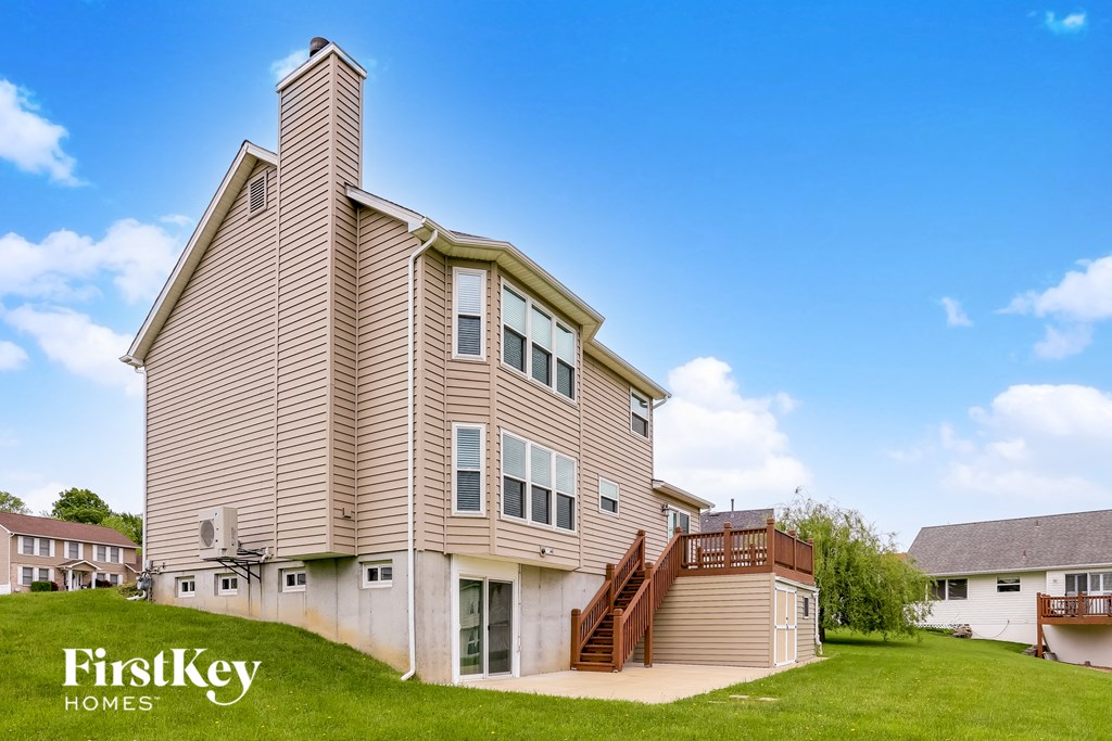 a view of a house with a wooden