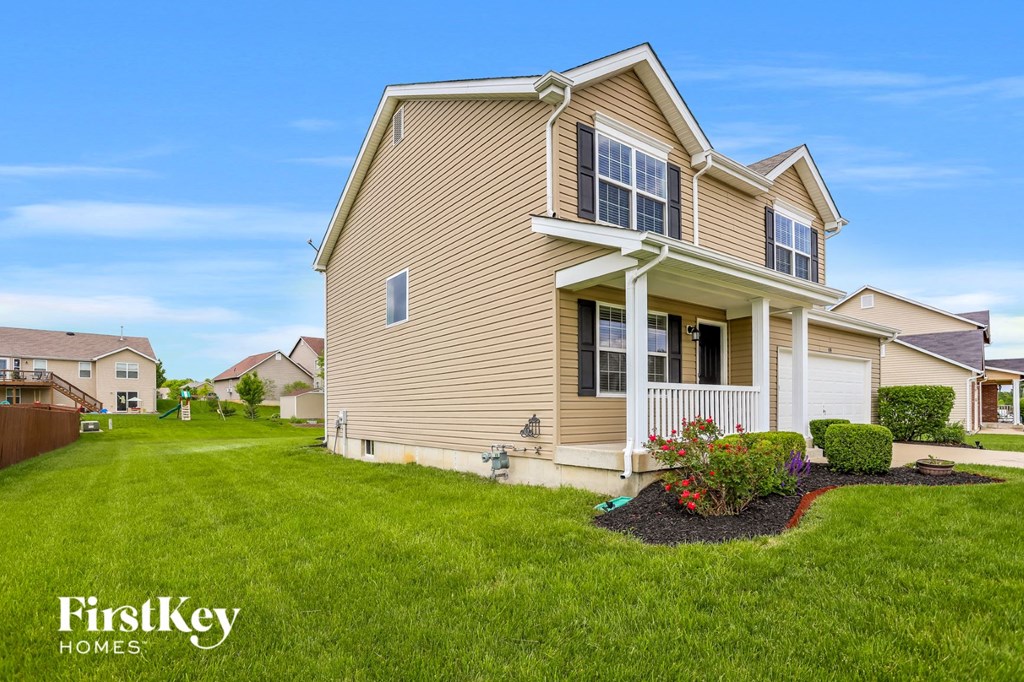 a house with a yard and a lawn