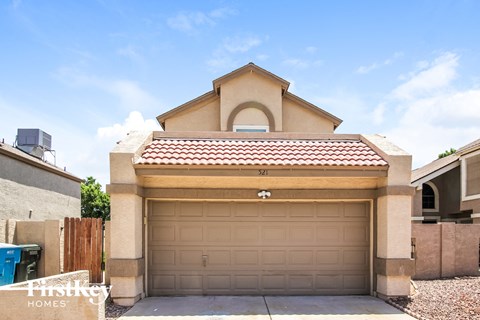 a garage door in front of a house