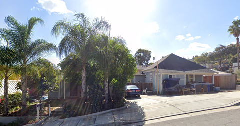 a house with a car parked in front of it