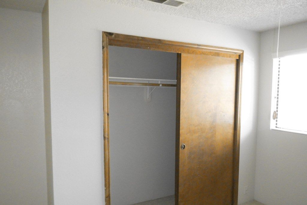 the door is open to the closet in the master bedroom