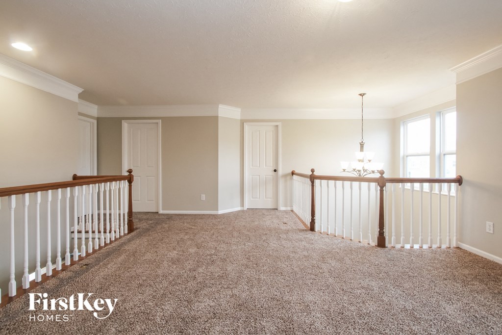 a fisheye view of the upstairs living room from the loft