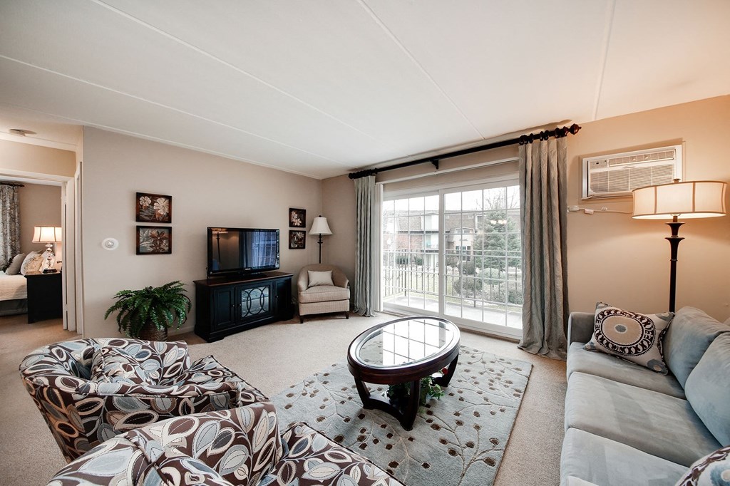 a living room with a couch and a table