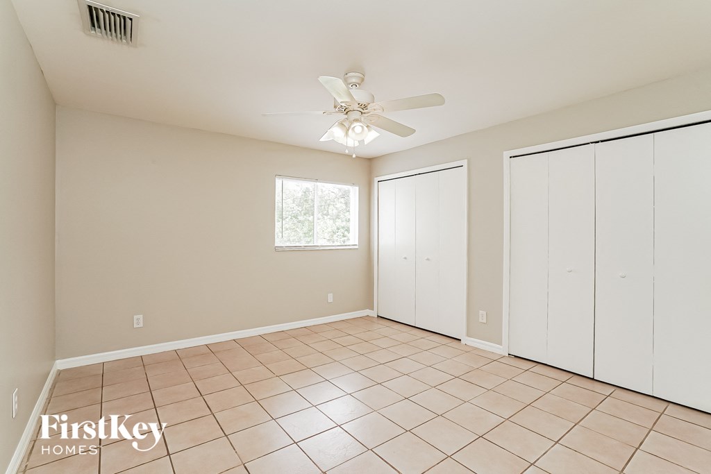 the living room is clean and ready to be used as a laundry room