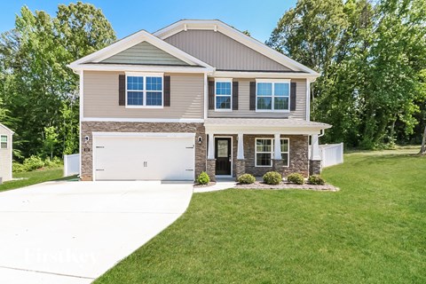 a house with a garage and a lawn