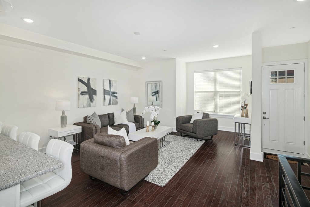 a living room with a couch and a table