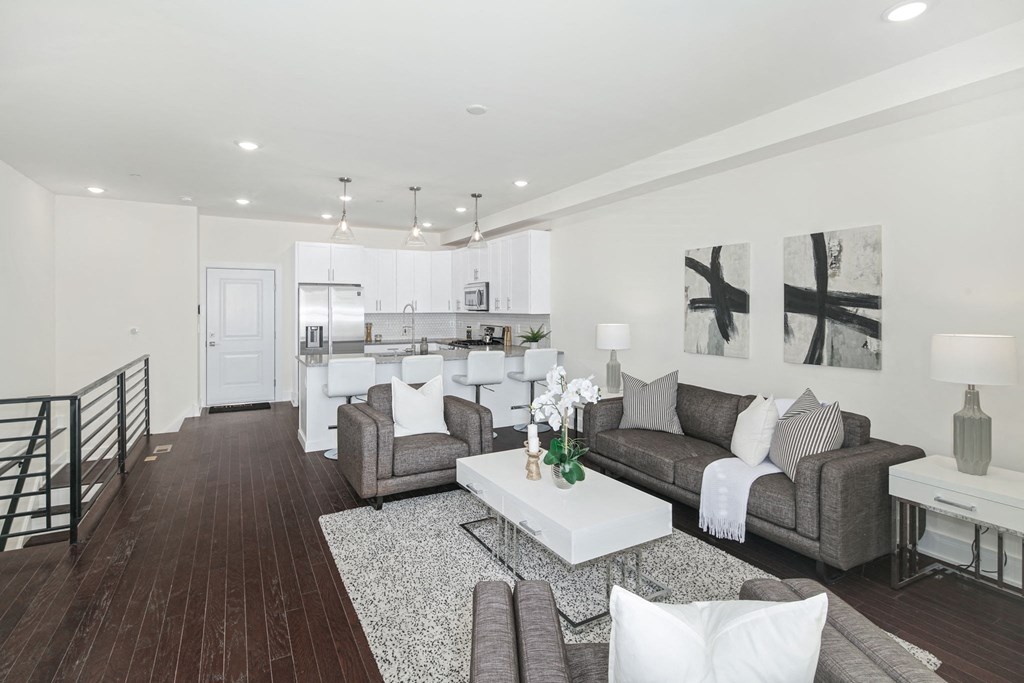 a living room with couches and a coffee table