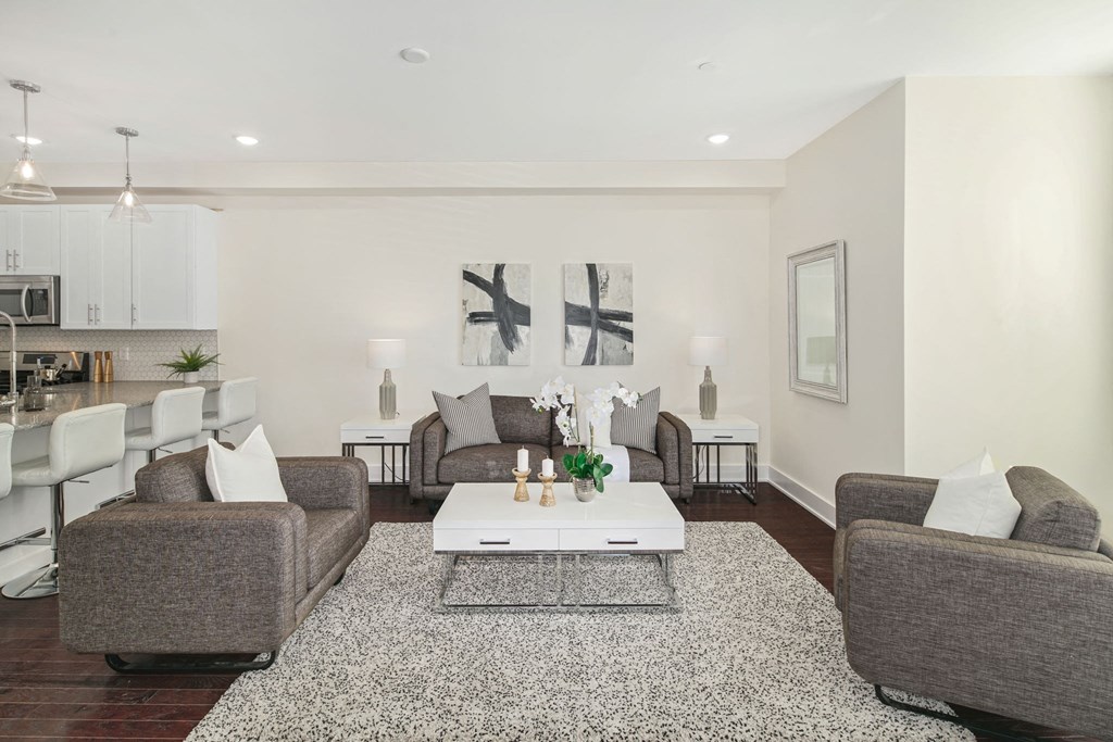 a living room with couches and a coffee table
