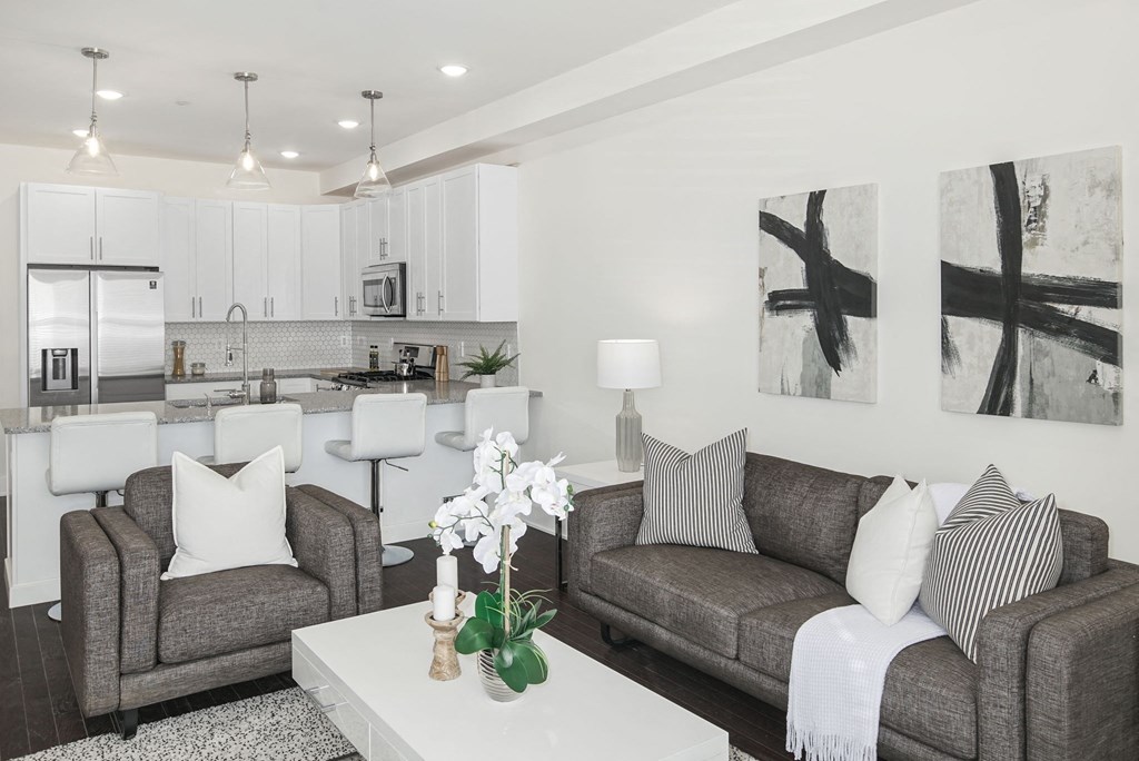 a living room with couches and a coffee table
