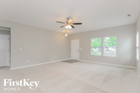 the spacious living room is clean and ready to use