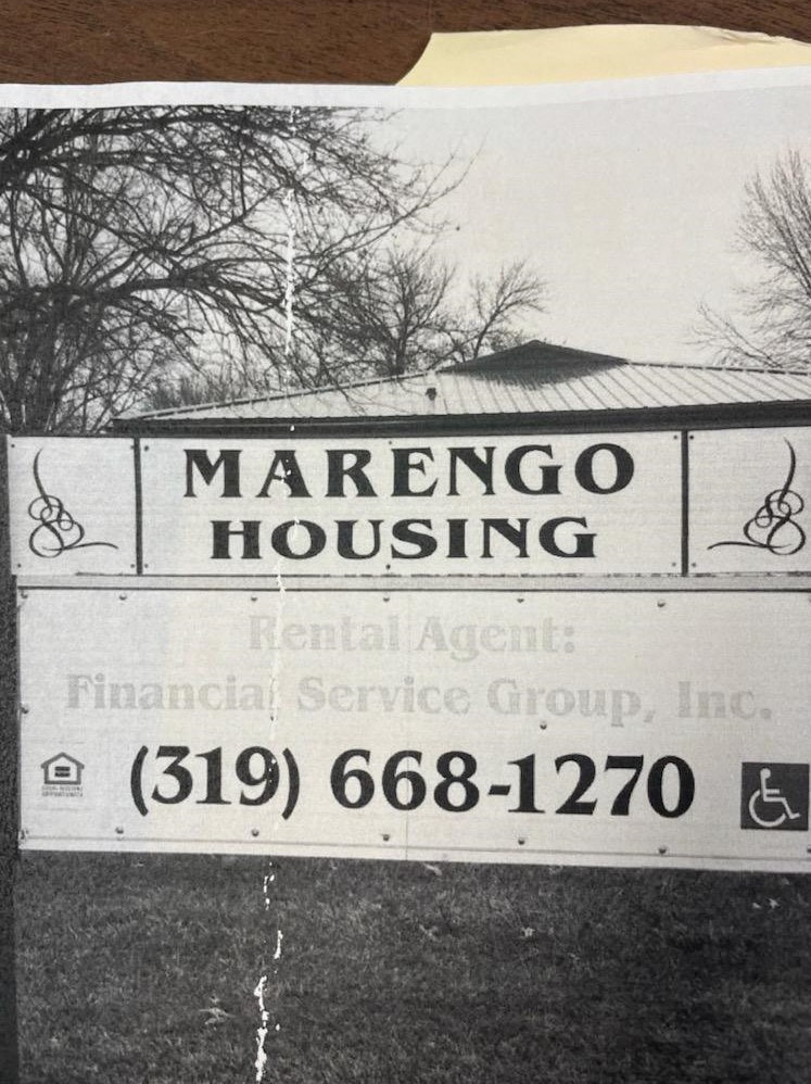 a sign formarongo housing is shown in front of a building