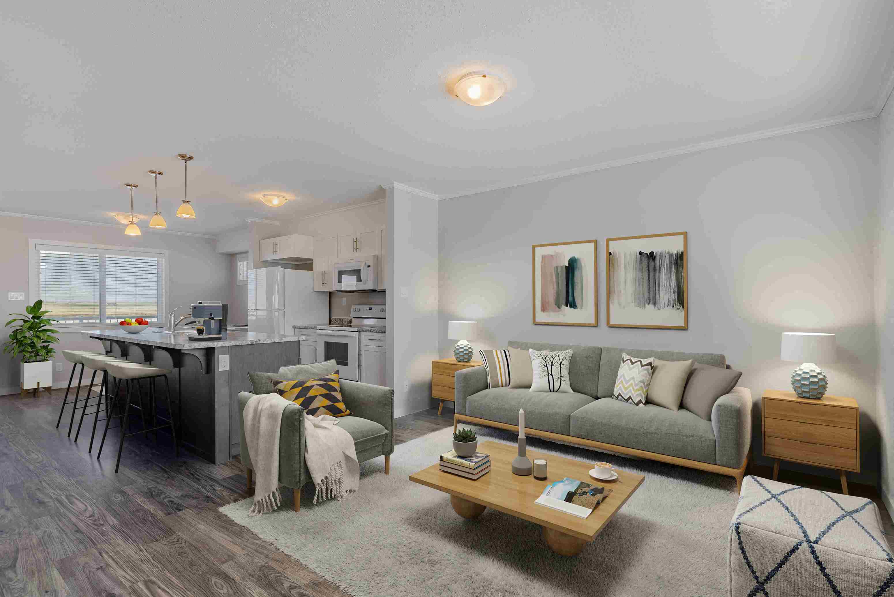 a living room and kitchen with a couch and a table