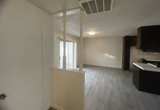 an empty living room and kitchen in a house