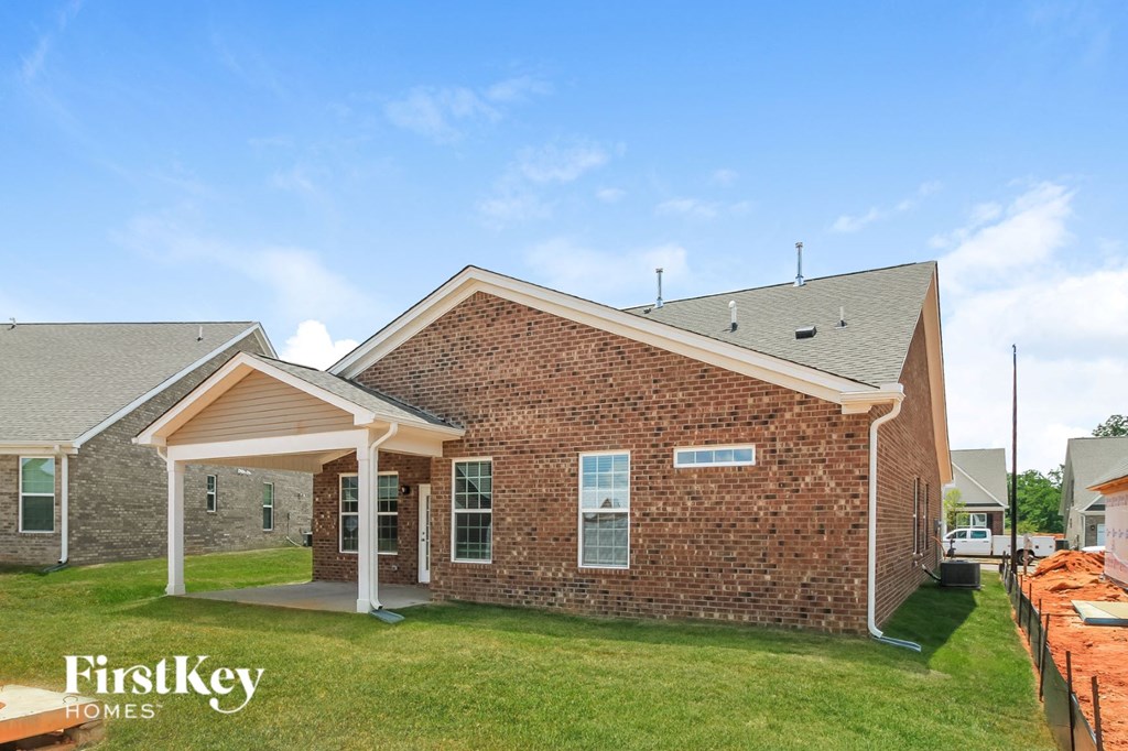 the preserve at bridgewater exterior of home with brick and grass