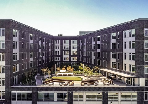RiverWest Apartments Vancouver, Washington Building Exterior Courtyard Aerial photo of building view from the west of courtyard and apartments