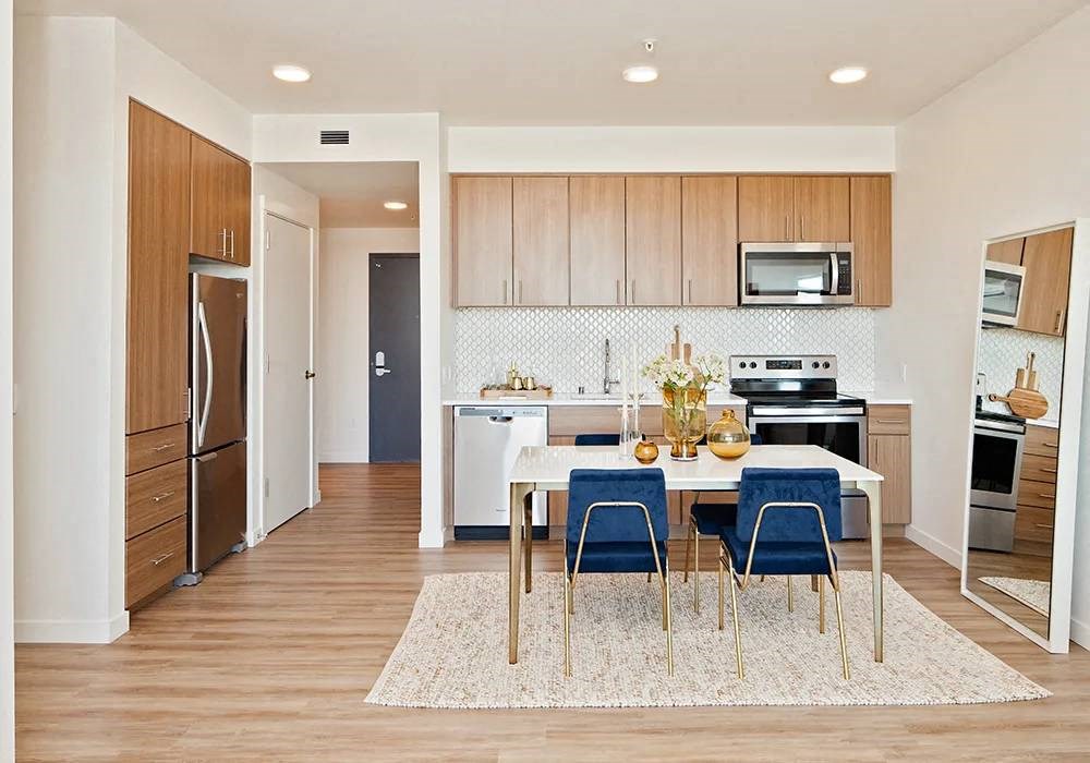 Interior of one bedroom with dining room and kitchen area