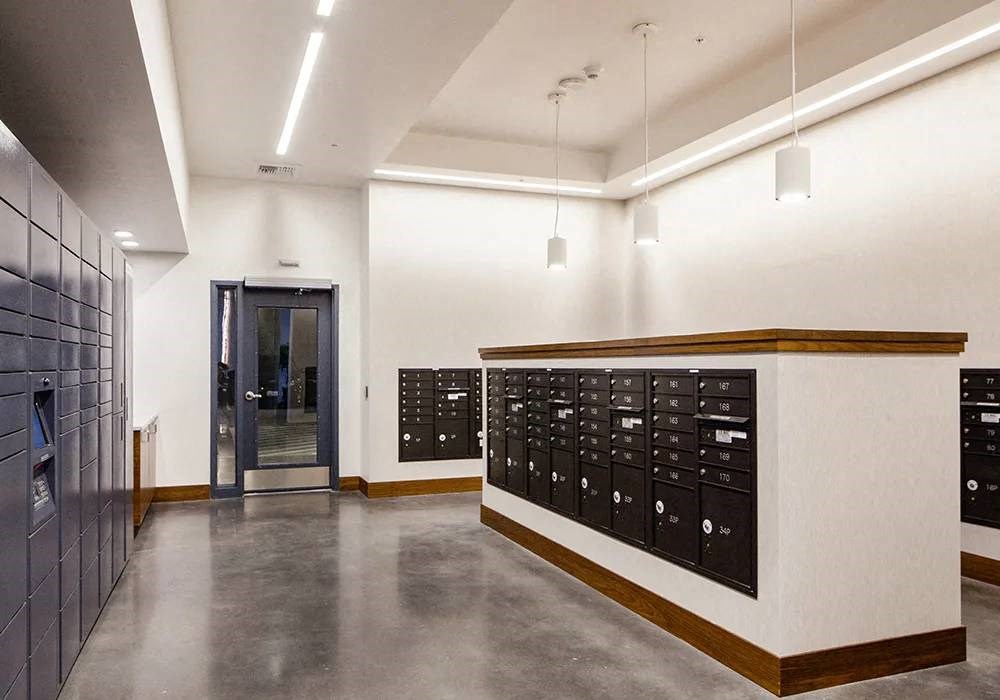 Mail room with package lockers and mailboxes