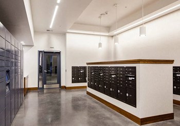 Mail room with package lockers and mailboxes - Photo Gallery 21