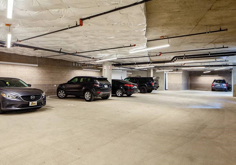 Covered parking garage with assigned car parking