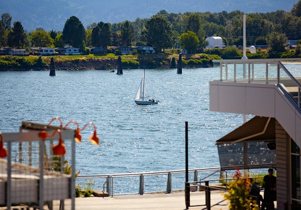 Columbia River viewed from Grant Street Pier. Small sailboat