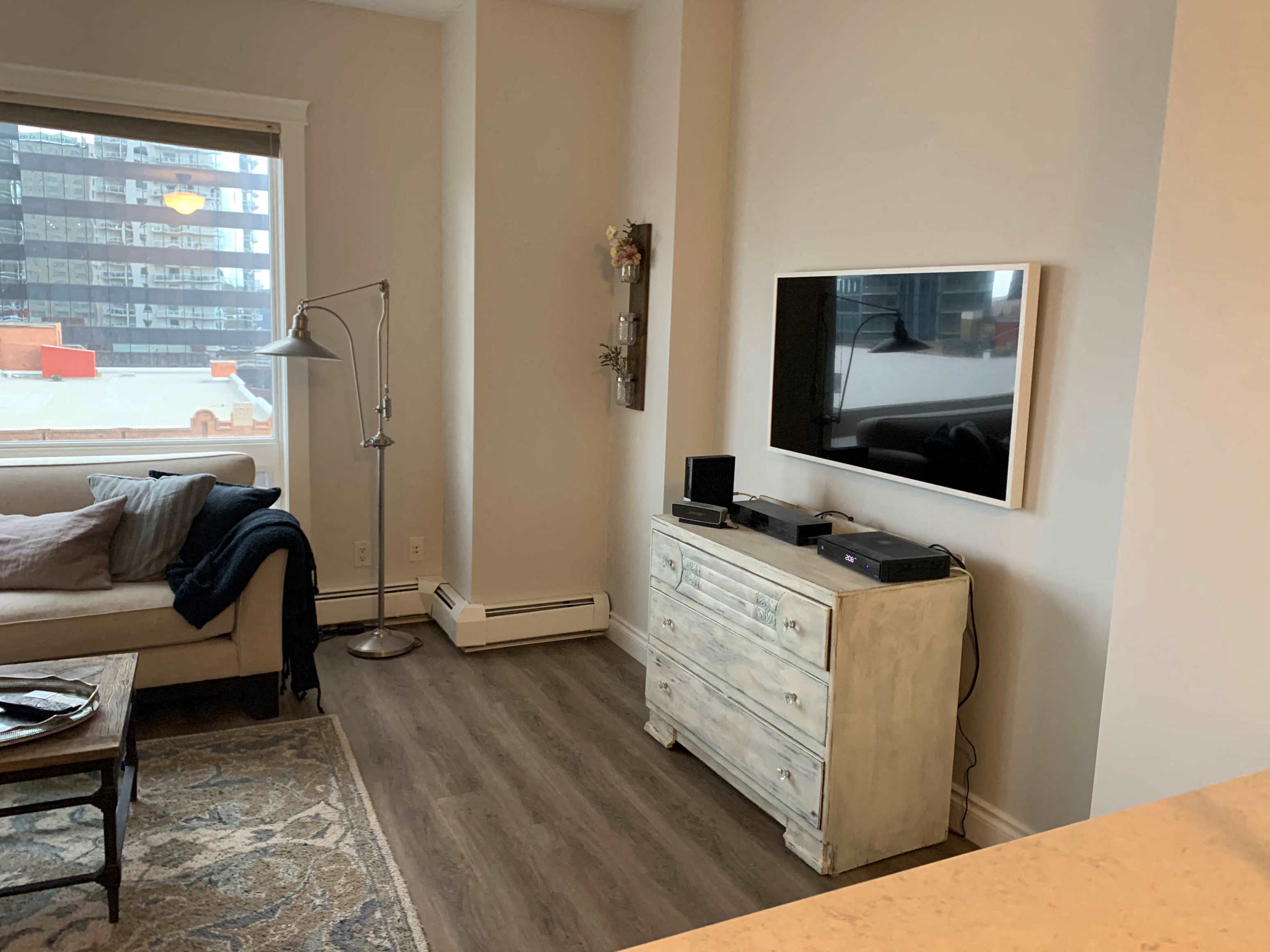 a living room with a tv and a couch