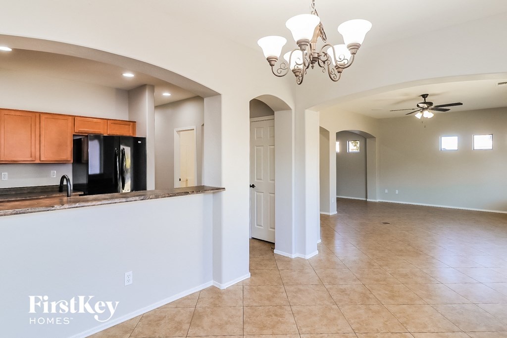 a kitchen and living room with an open floor plan