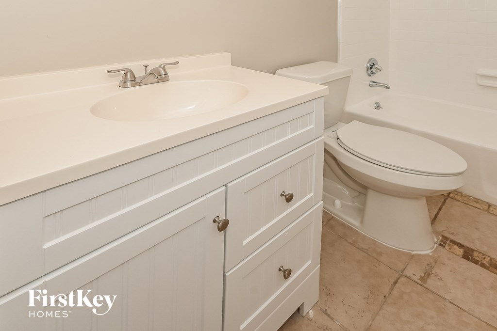 a bathroom with a sink and a toilet