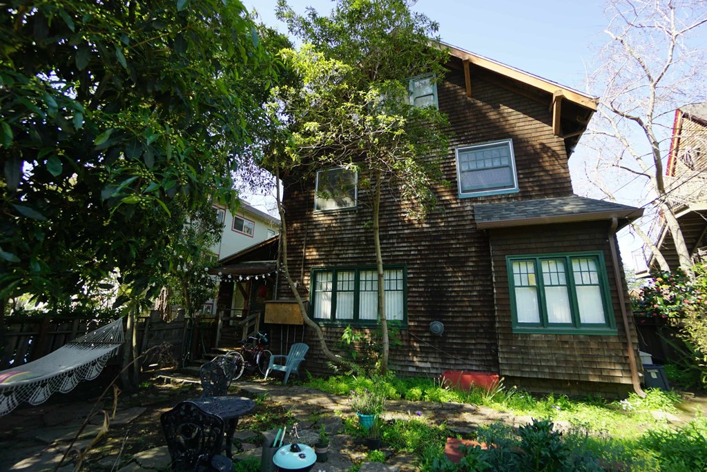 a house with a yard in front of it