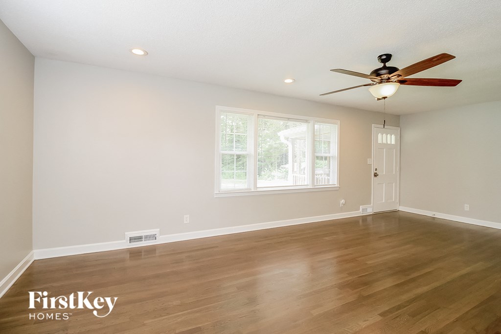the living room is clean and ready for us to move in